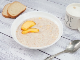 Каша молочная пшеничная с персиком